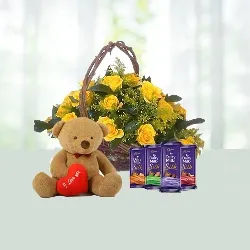 V Day- Basket of 15 Yellow Roses with 4 Dairy Milk Chocolates N Teddy