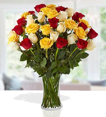 pw-red-yellow-white-roses-glassvase-uae.jpg