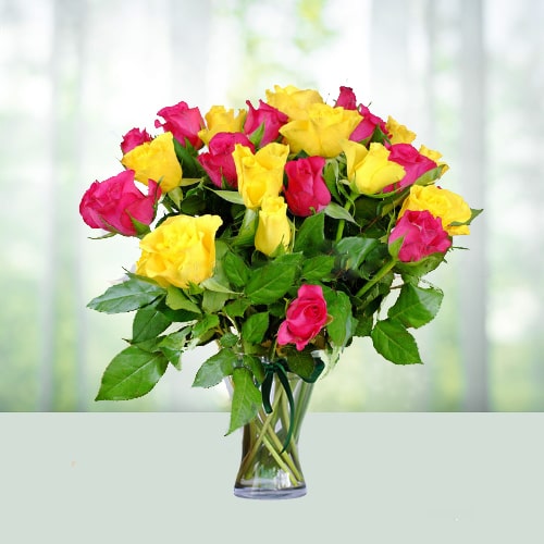 Pink n yellow roses in a vase
